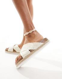 ASOS DESIGN Jessie flatform cross strap espadrille sandals in off-white crochet tuote hintaan 22€ liikkeestä Asos