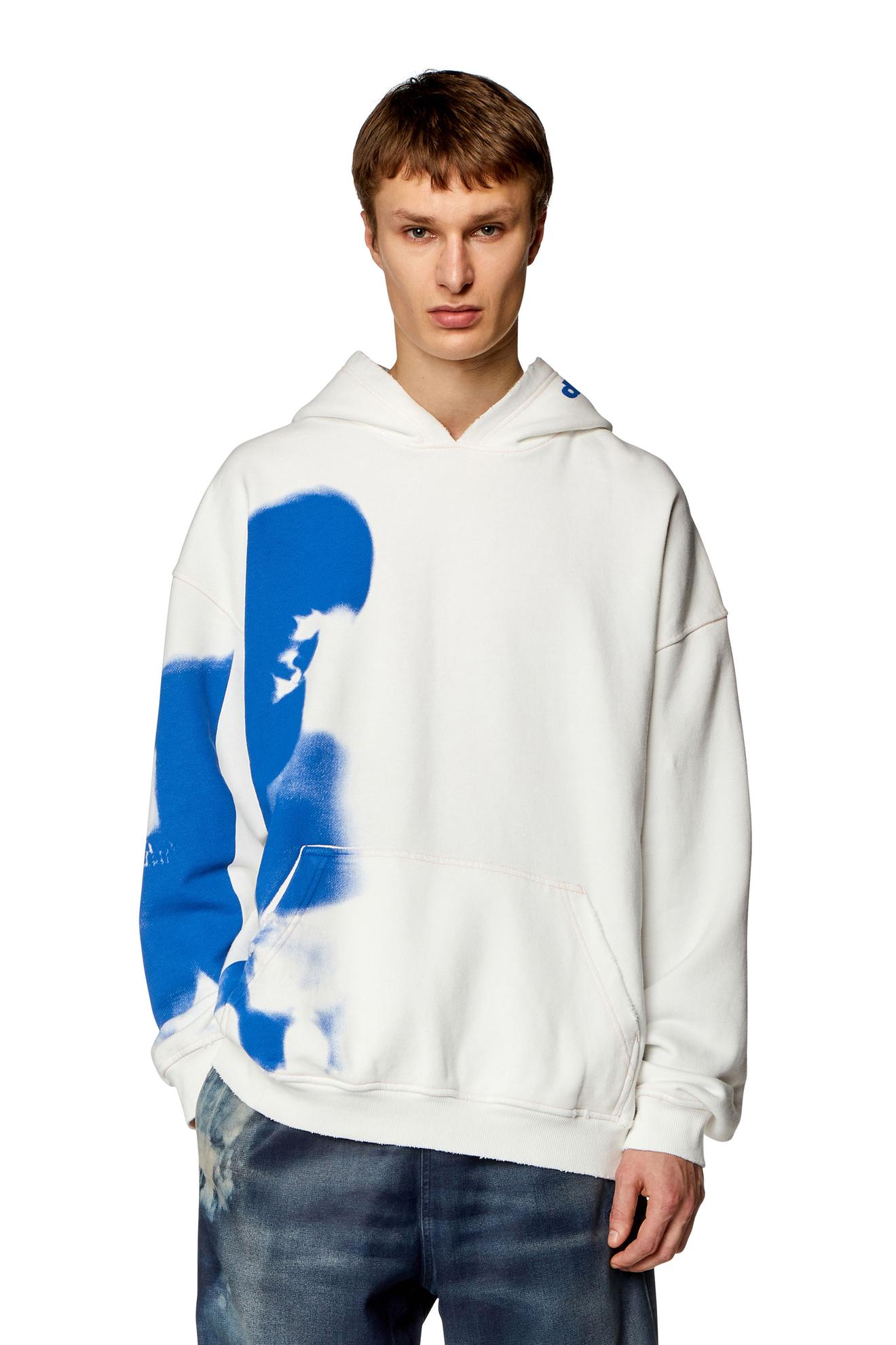 Distressed hoodie with smudgy print tuote hintaan 195€ liikkeestä Diesel
